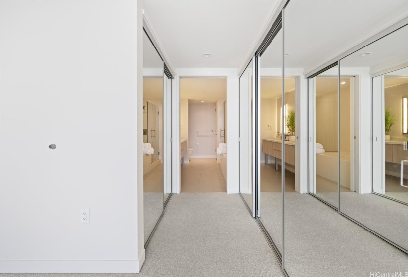 Master bedroom with mirrored sliding closets