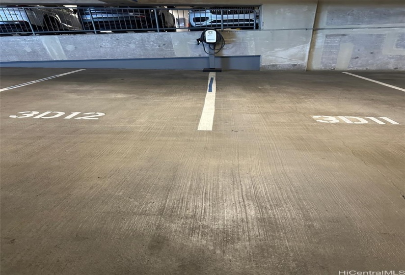 Side by side parking stalls w/ EV charger