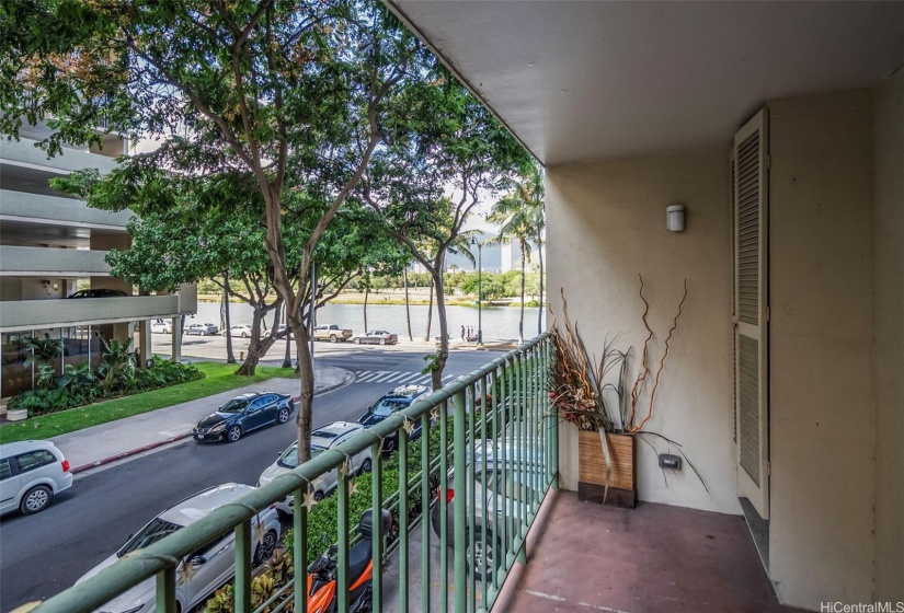 Covered lanai view with storage, allowing natural light and cool breezes in