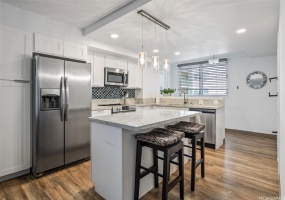 Step into the condo were you are greeted with an expansive kitchen