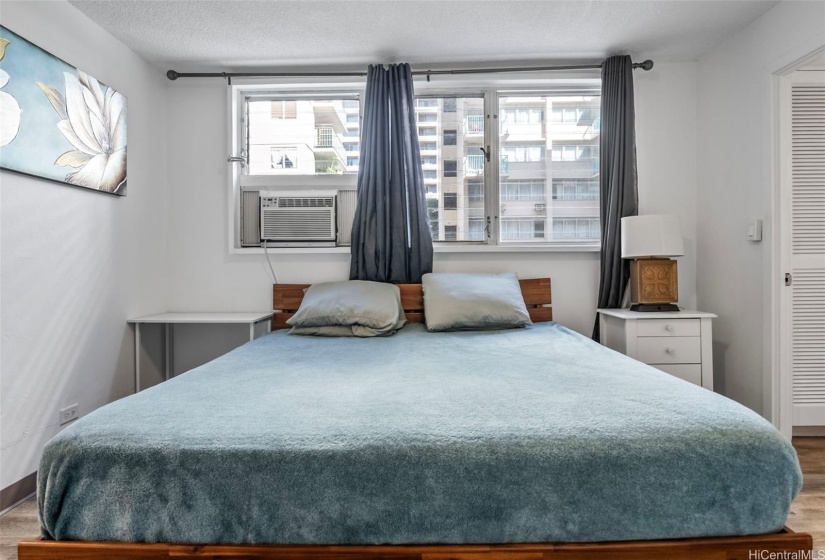 Primary bedroom with AC unit