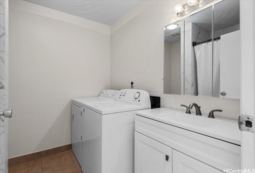 The upstairs restroom includes an upgraded shower and tub! It also features your own washer and dryer.