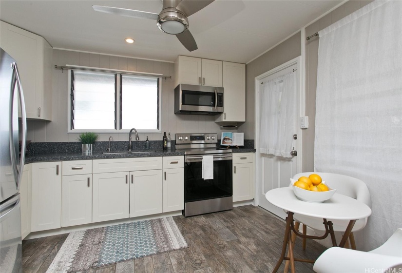 Nicely done kitchen with lots of storage - lanai off the kitchen.