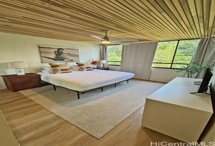 Primary bedroom windows overlook the neighboring park and your deeded parking stall... 1875 KALANIANAOLE AVE, #311