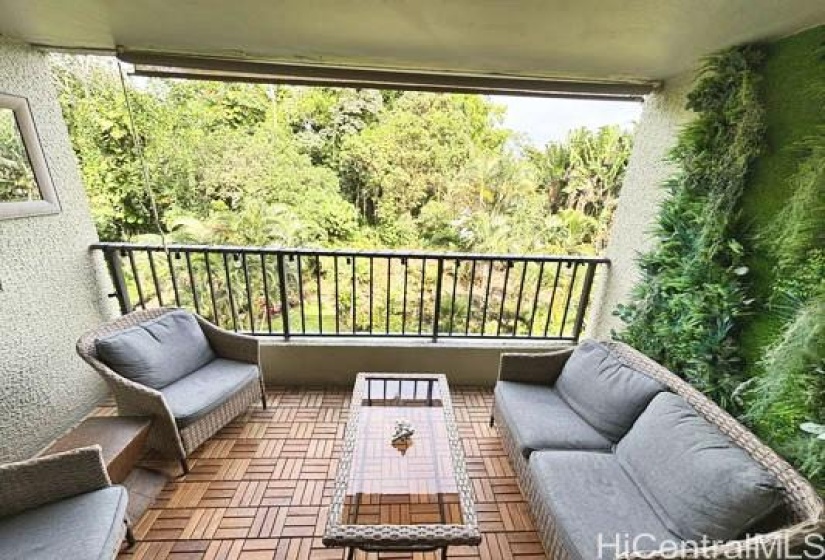 The lanai overlooks your deeded parking spot for 1875 KALANIANAOLE AVE, #311