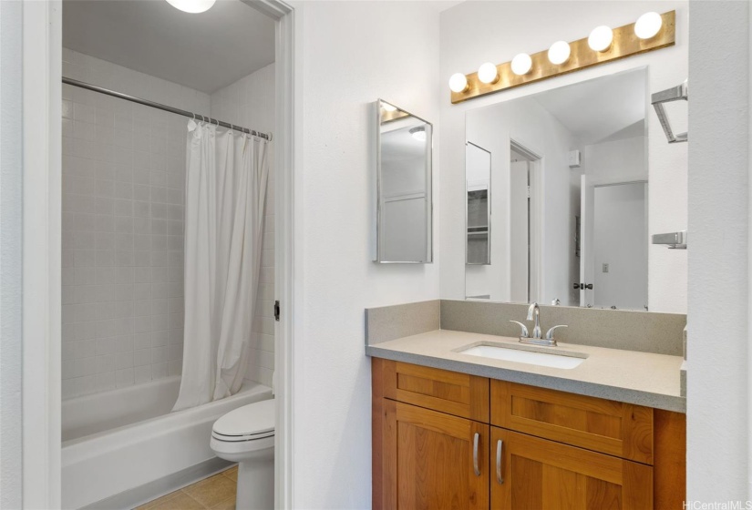 Remodeled vanity with quartz counter top