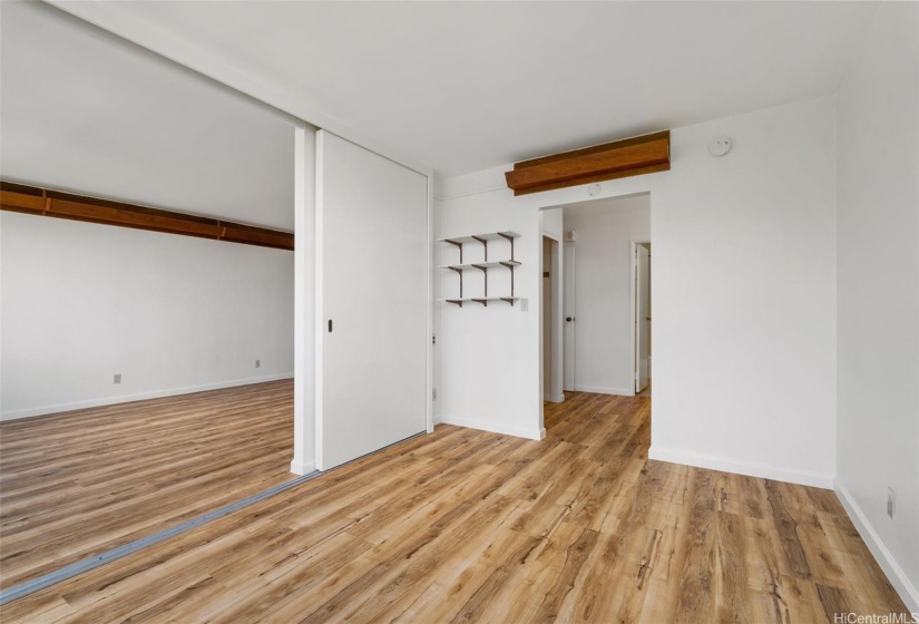 In bedroom looking out to the living area