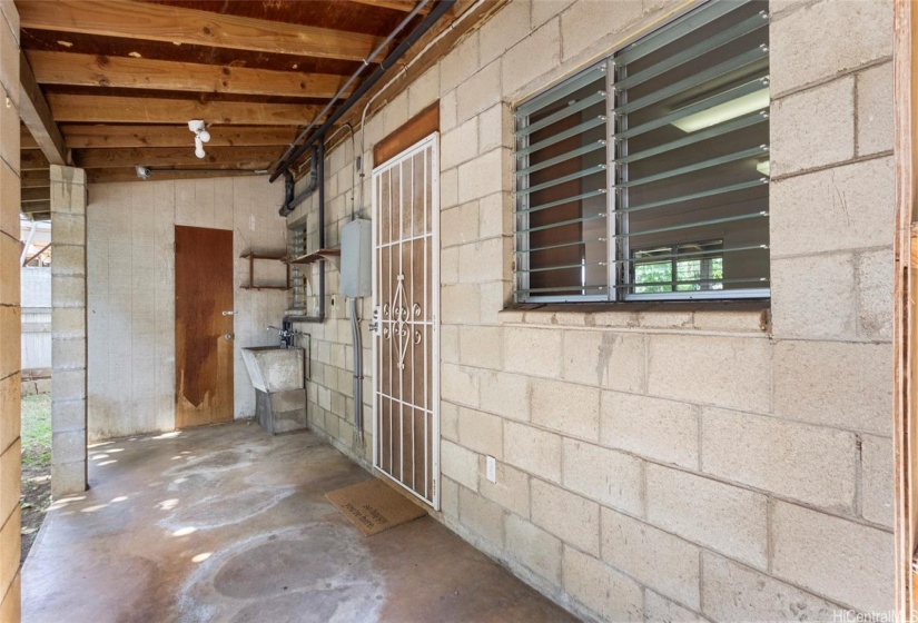 Covered patio #2 with separate entrance #5 into the downstairs addition