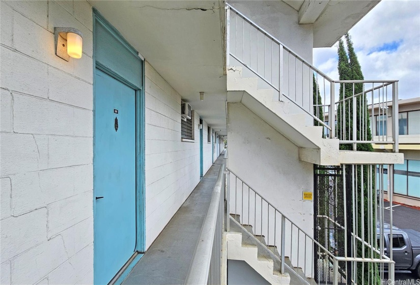 The unit is right across the stairwell, which on the ground floor is across the parking stall.