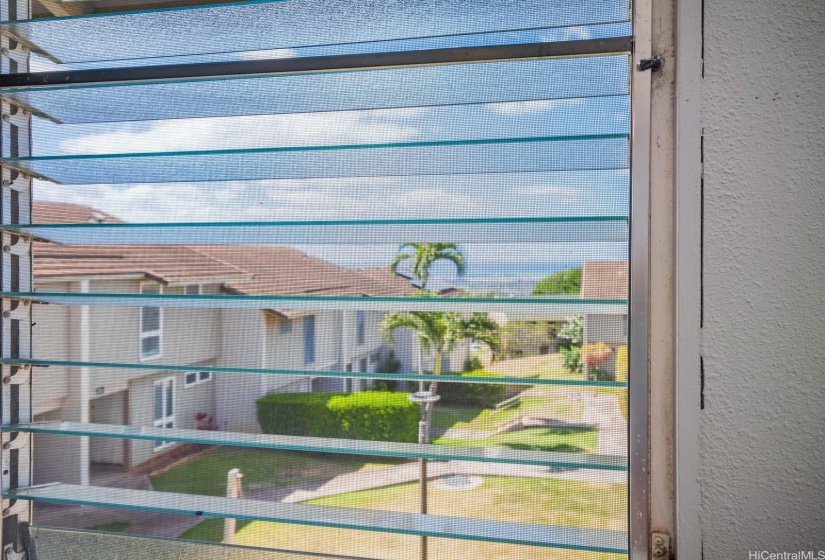 Peek-a-boo ocean view from primary bedroom