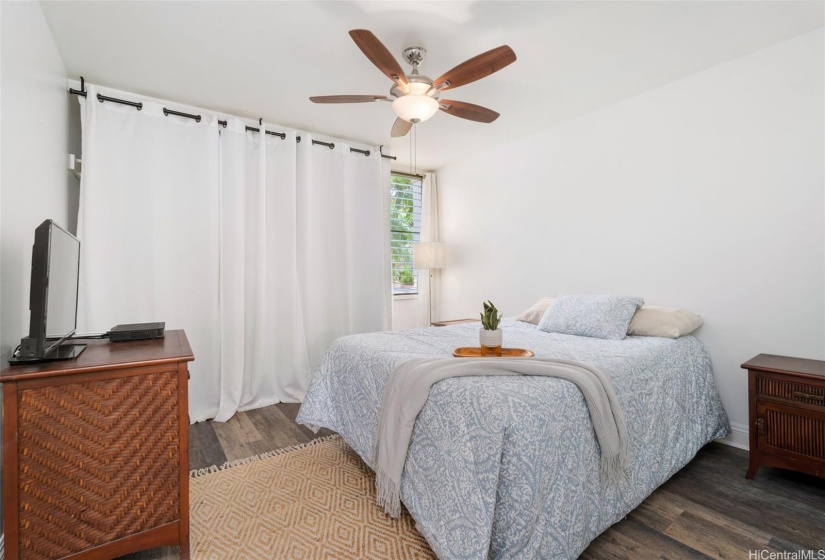 Main bedroom comfortably fits a Queen bed.  Bed to be included.