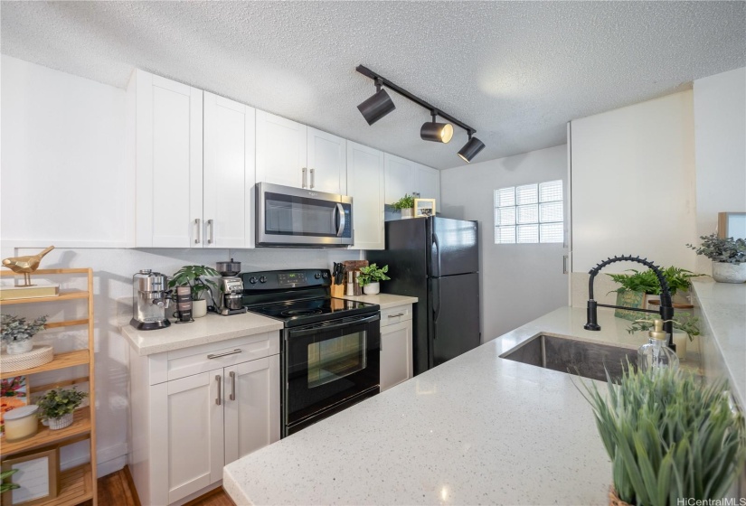 Upgraded Appliances, Modern Kitchen and Island Dining option as well!