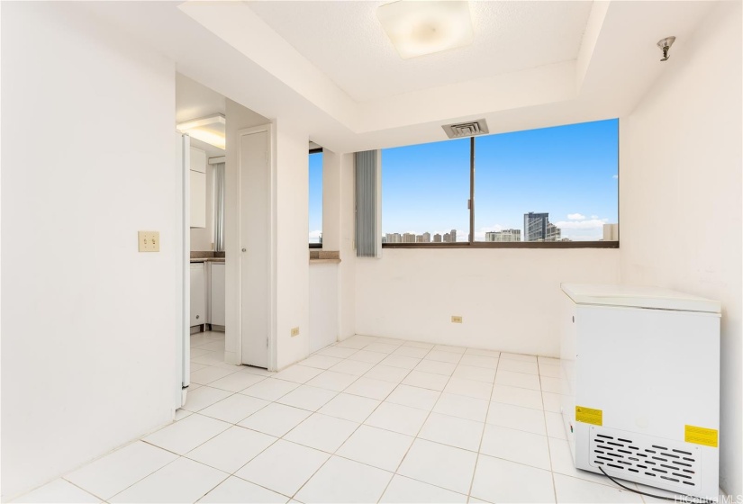 Dining area with a view & your kitchen on the left.