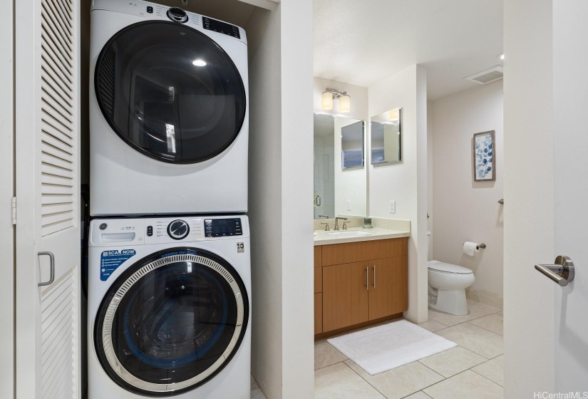 The stackable washer/ dryer are in the hall bathroom