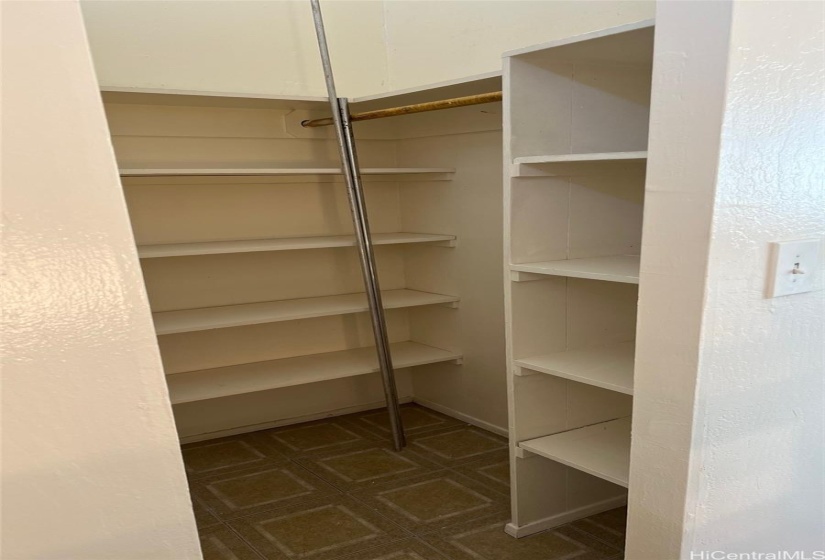 Linen closet of primary bedroom