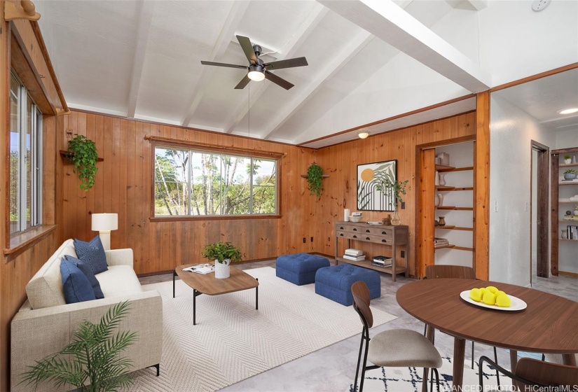 Second floor living room with hallway that leads to two bedrooms and one full bathroom. Virtual Staging. Enhanced