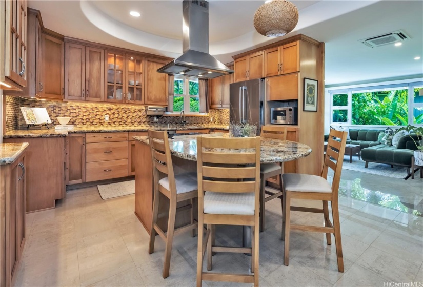 The kitchen is central between the living room and dining room.