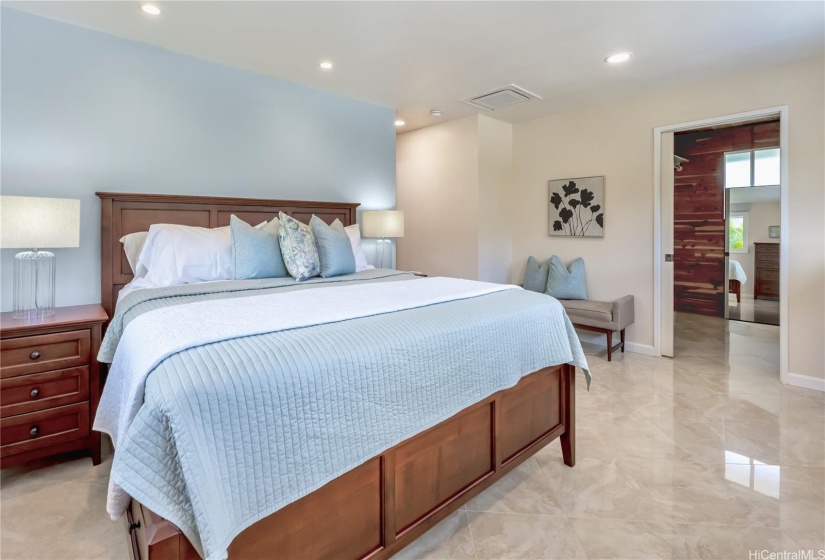 The primary bedroom includes a large walk-in cedar lined closet.