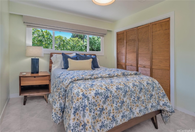 Each bedroom includes a custom 2-blind system with a blackout shade and light filtering. Through each window are greenery views.