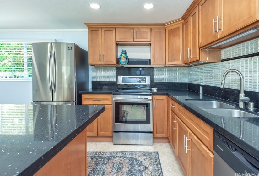 The downstairs family room was designed with a kitchen for easy outdoor entertaining and preparations.