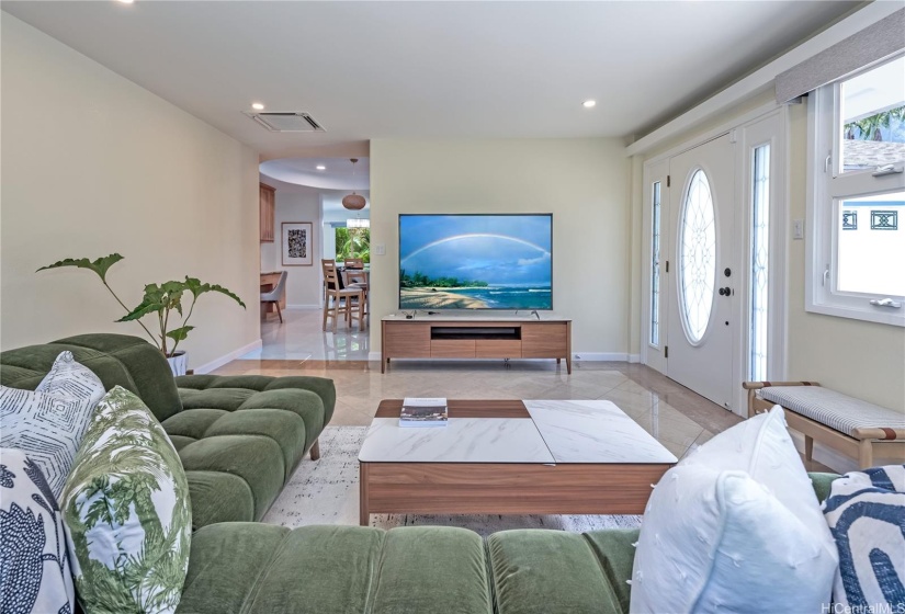 The living room, kitchen and dining area flow seamlessly together.