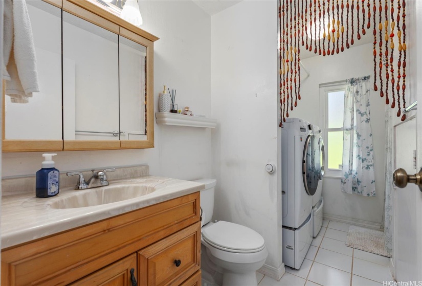 Bathroom #1 downstairs with shower and washer/dryer