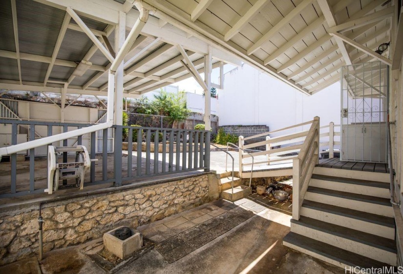 Back of house looking at carport area