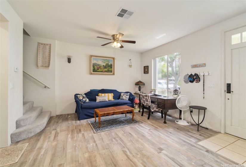 Living room to the right of the front entry door.