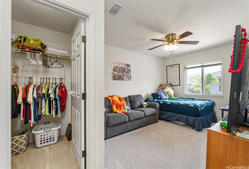 Third bedroom with walk in closet.