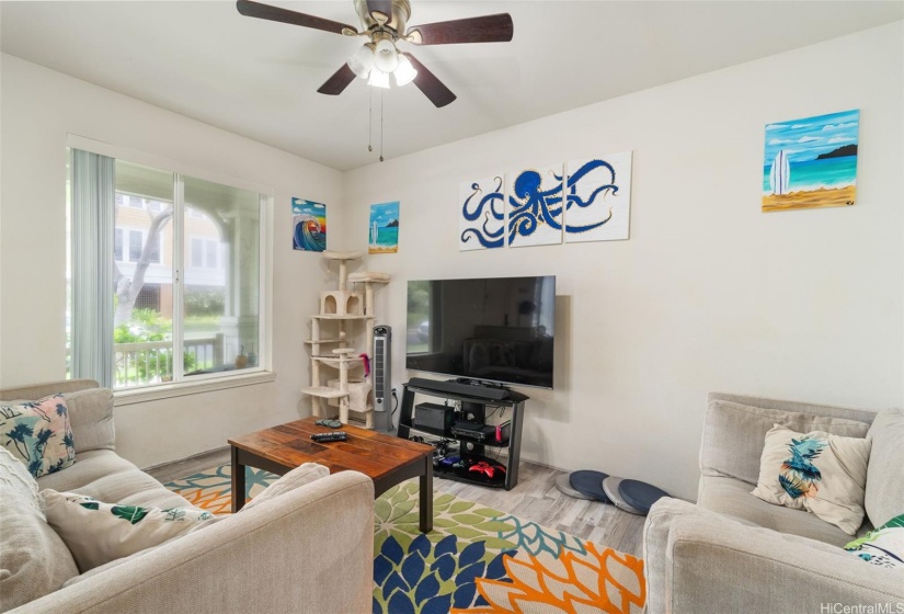 Living room to the left of the front entry door.