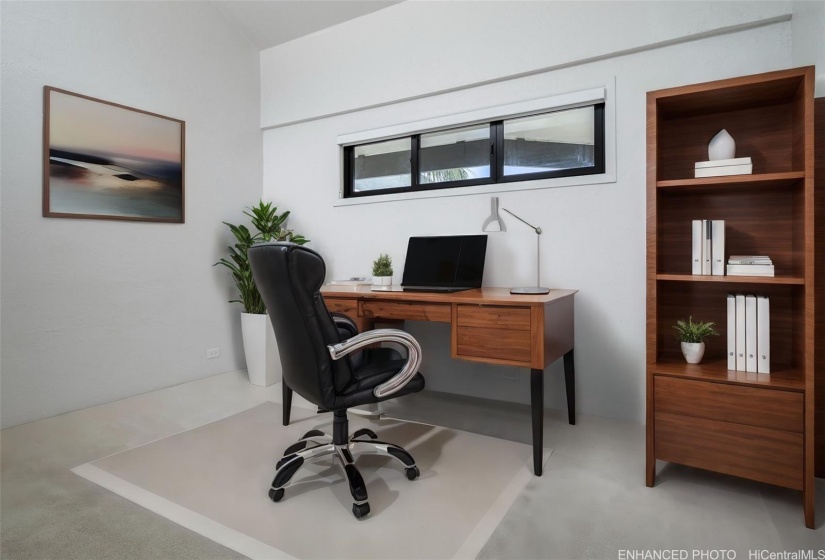 Enhanced photo. Bedroom #3 can be utilized as a home office space.