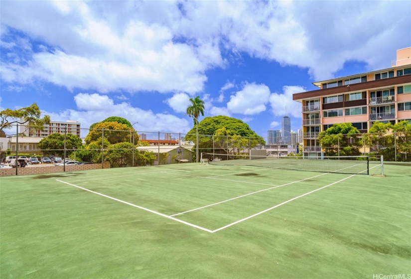 The community tennis court is conveniently located right next to your 800 SF lanai.