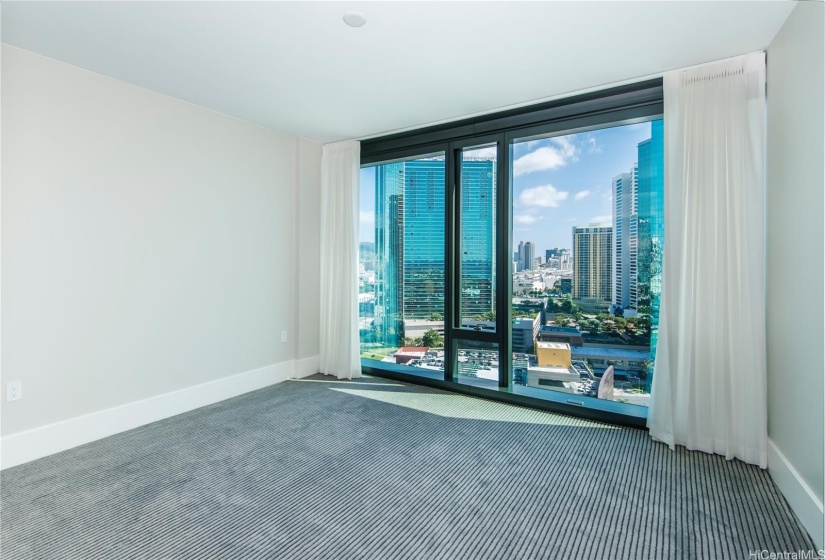 The 2nd bedroom offers you distinct city views as well as Diamond Head and Ocean views.