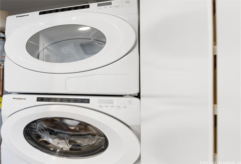 Full sized washer and dryer in hall closet