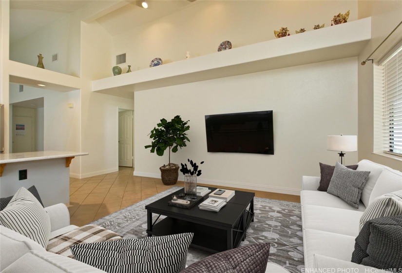 Enjoy entertaining in this bright  family/living room . Virtually staged .