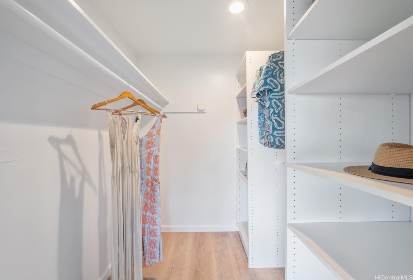 Primary walk-in closet with built-ins