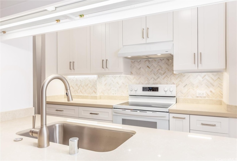 Lights are installed under the cabinets.