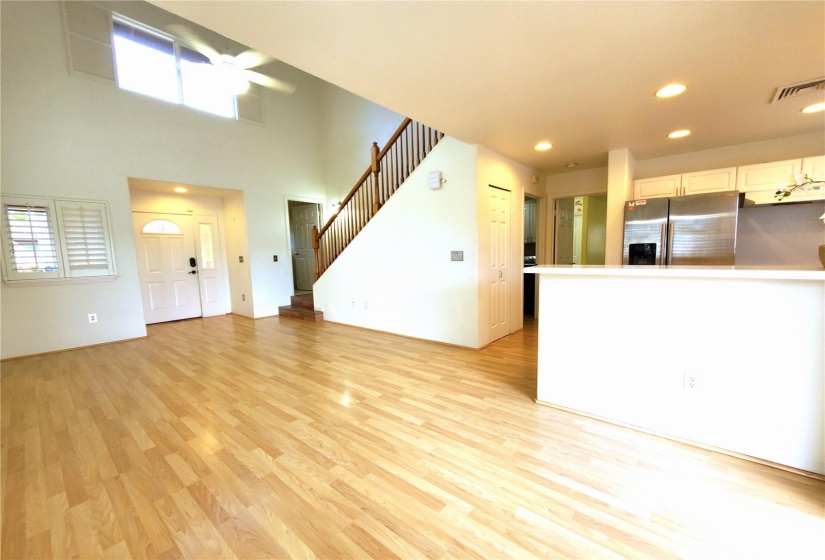 Living area looking towards the kitchen, into the laundry room and back to the main bedroom