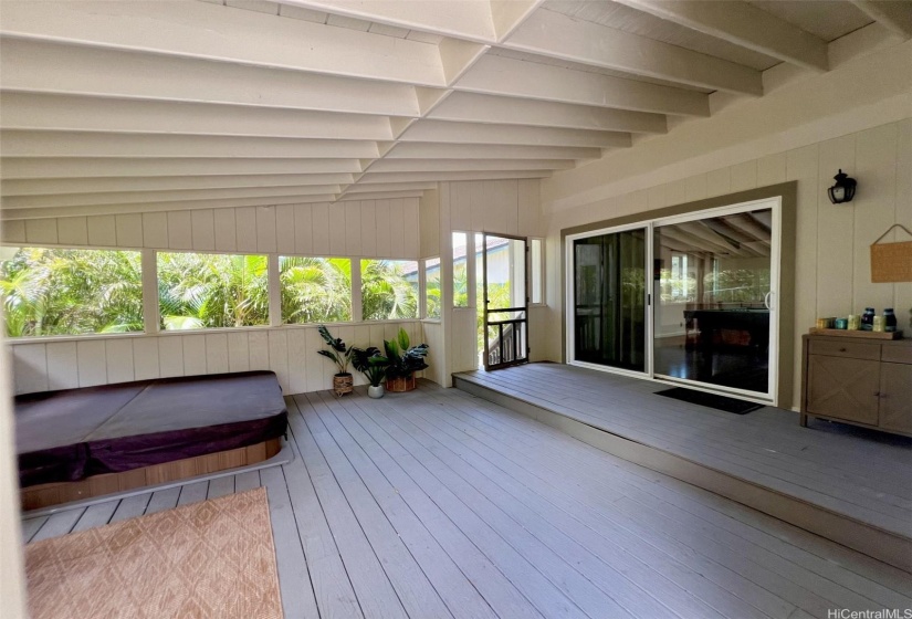 When it's time to chill, enjoy this large enclosed lanai with seating area and jacuzzi