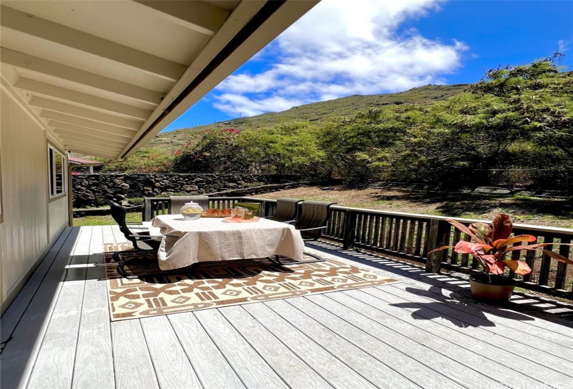 Enjoy al fresco dining on this large deck just off the enclosed lanai set in a private setting