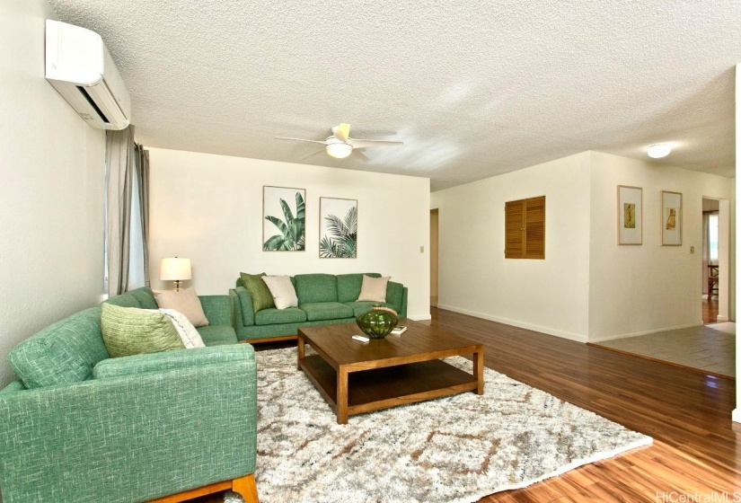 Another living room view with front entry. This is an oversized living space that allows for many configurations.