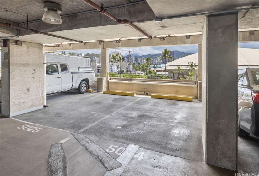 Covered parking stall in the open air garage.