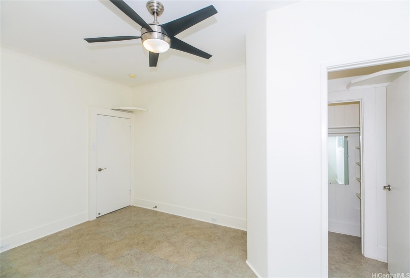 Bedroom with walk-in closet