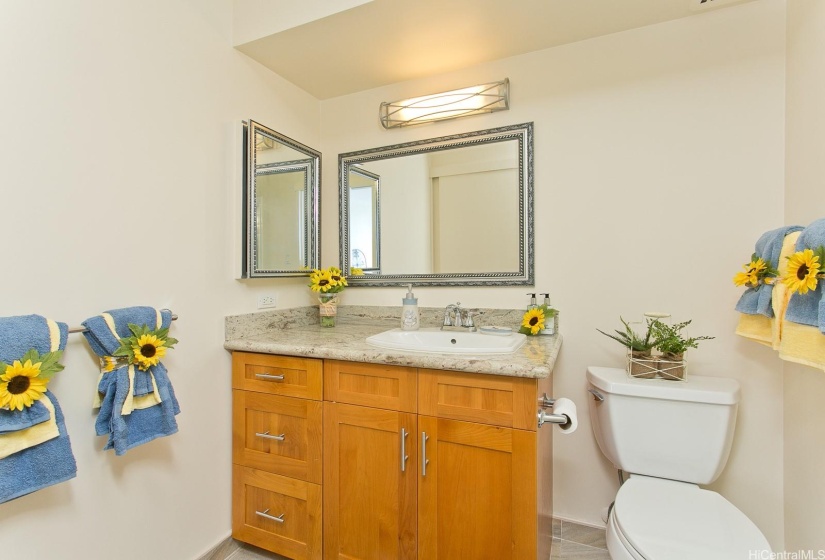 Ah, refreshed and renewed you're ready for a brand new day in this upscaled bathroom.