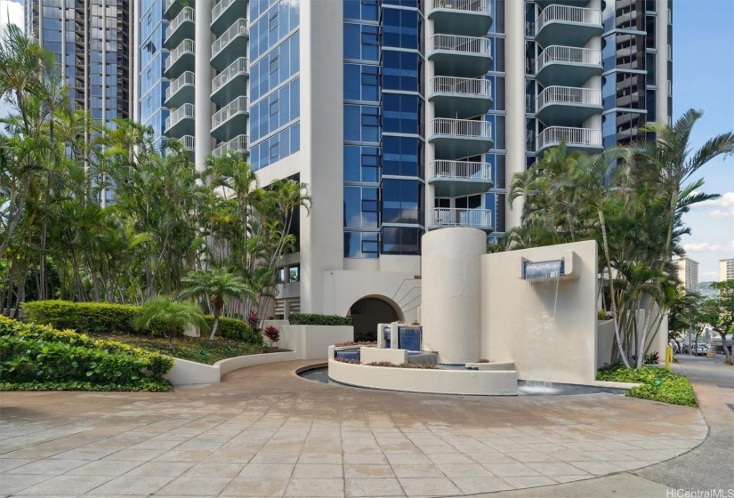 Fountain at entrance to building.