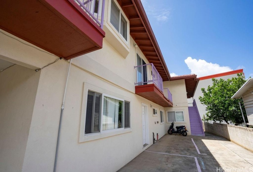 The upstairs units have own private balconies.