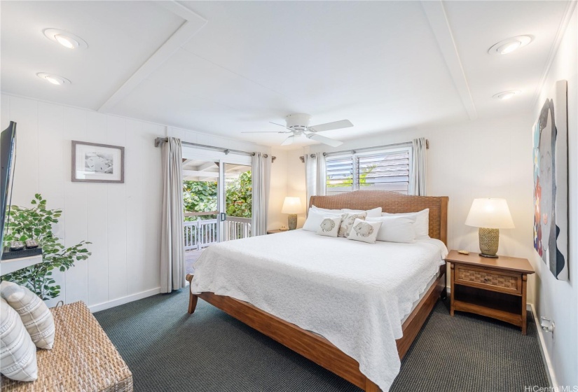 Primary bedroom with back patio access