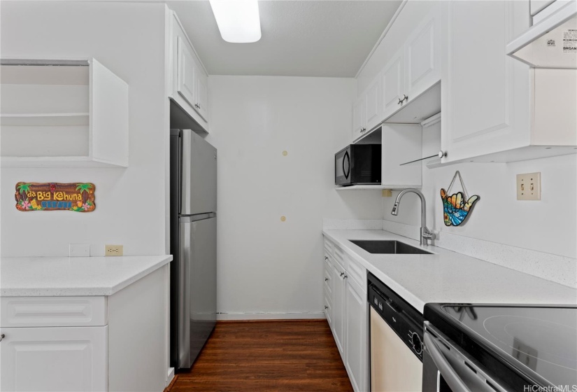 Kitchen has lots of storage.