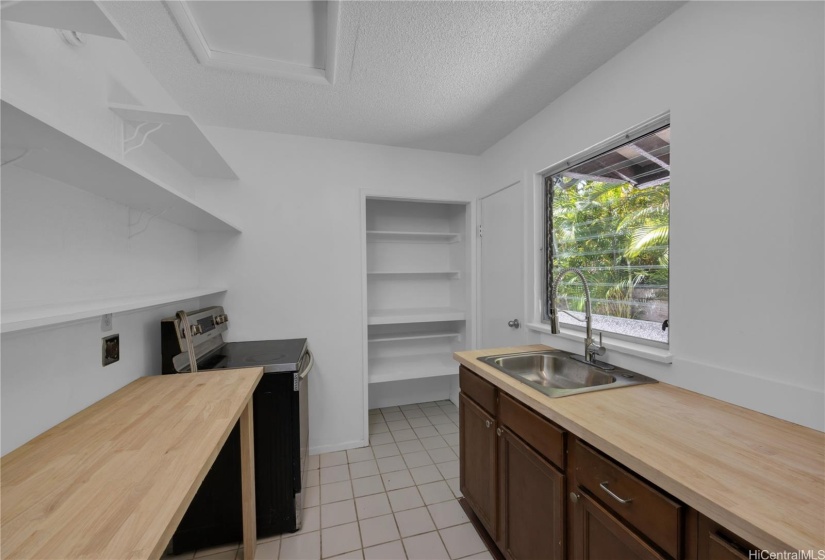 Kitchenette in 2 bedroom 1 bath with a separate entrance.