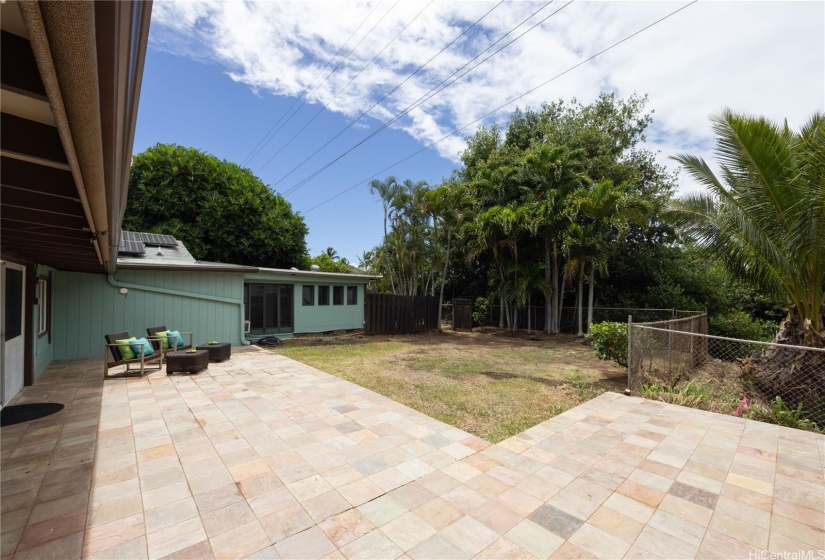 Huge lanai facing the canal with tropical yard to enjoy listening and watching birds and ducks!